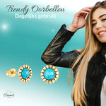 Gouden en turquoise oorbellen.