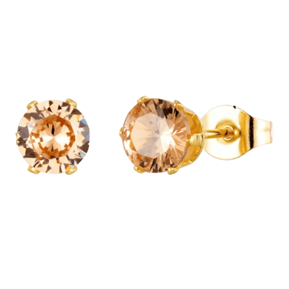 Paar gouden oorbellen met ronde champagnekleurige edelstenen.