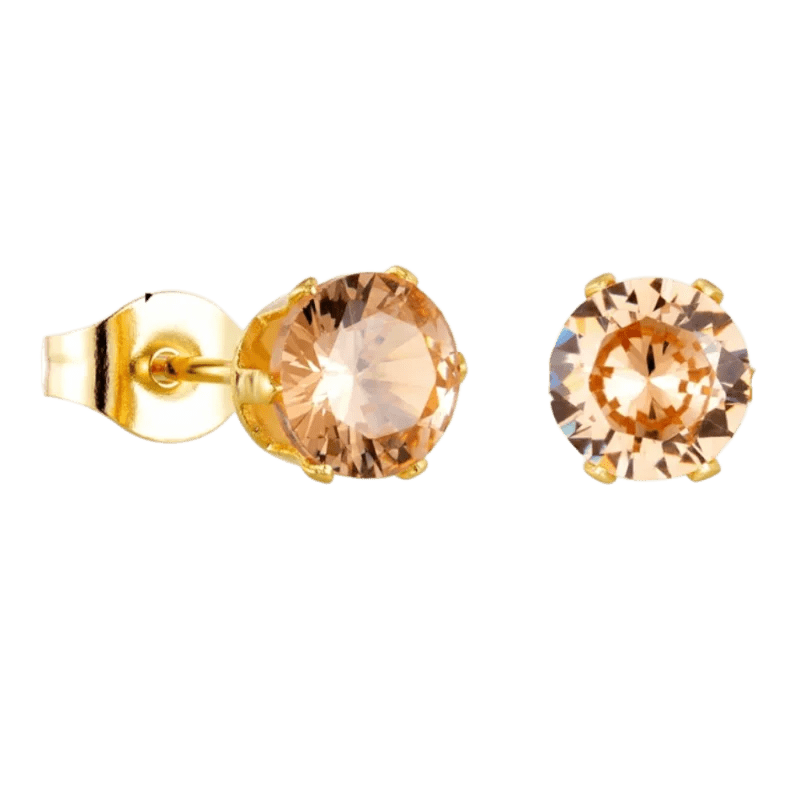 Paar gouden oorbellen met champagnekleurige edelstenen.