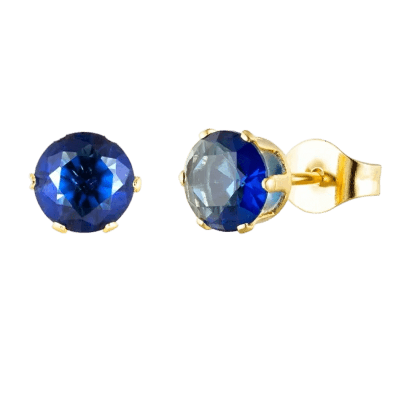 Paar gouden oorbellen met ronde blauwe edelstenen.