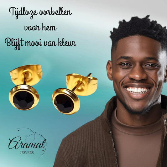 Gold-colored earrings with black crystals