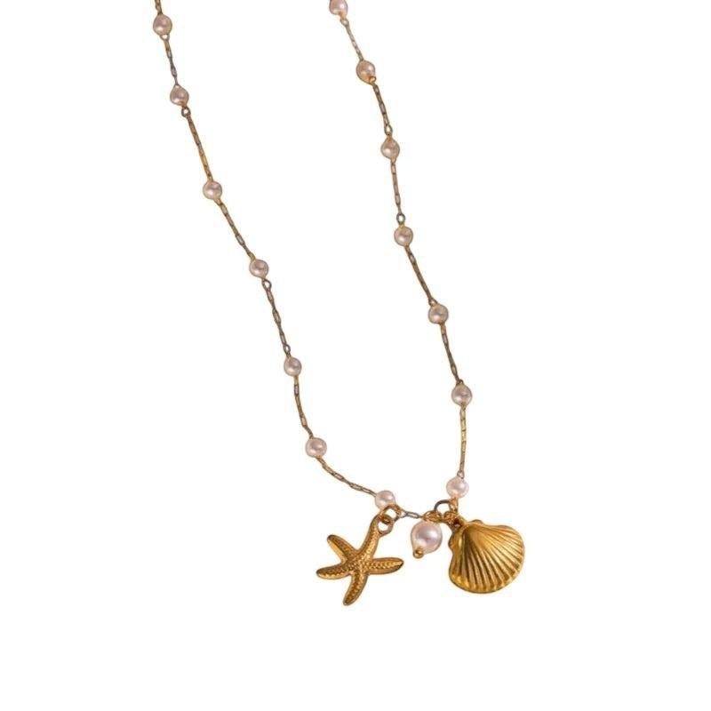 Goudkleurige parelketting met schelp & zeester – 40+5 cm - ket1182 - 599155 - Halskettingen kopen# - 40cm - alles - Bedelketting