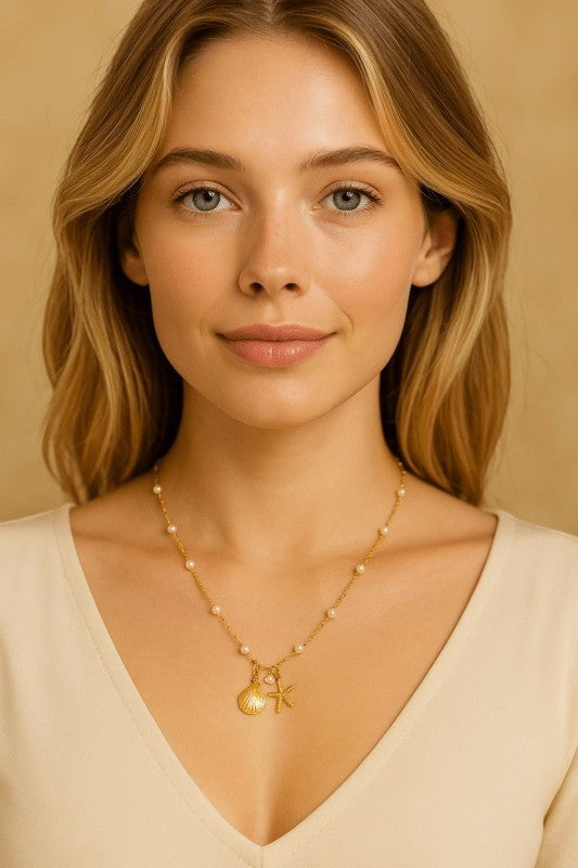 Goudkleurige parelketting met schelp & zeester – 40+5 cm - ket1182 - 599155 - Halskettingen kopen# - 40cm - alles - Bedelketting