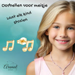 Gouden muzieknoot oorbellen.