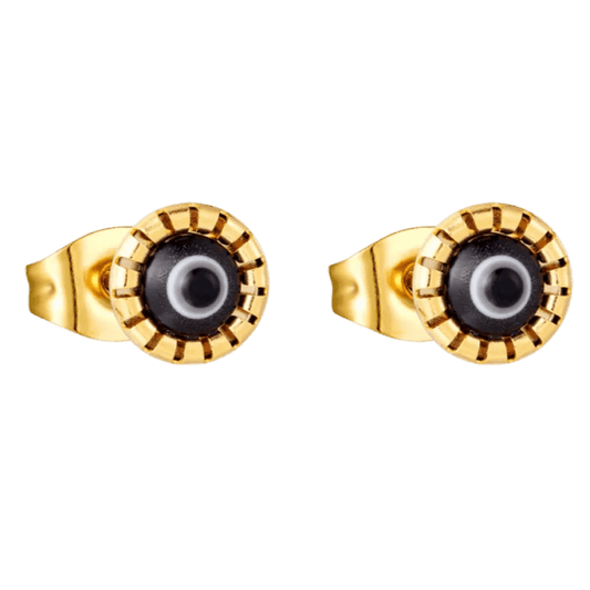 Paar gouden oorbellen met zwarte en witte cirkelvormige motieven.