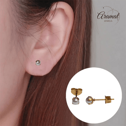 goudkleurige stalen parel oorbellen 4 mm - Aramat Jewels - Oorbellen - cadeautip
