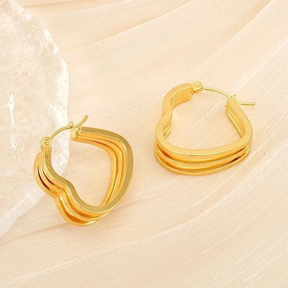 Goudkleurige Triple Hart Hoops 25mm - oor6303 - 827750 - Oorringen kopen# - 25mm - alles - cadeau