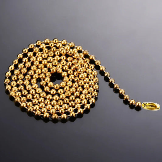 Goudkleurige Stalen Bolletjes Halsketting Van Aramat Jewels