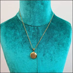 Ketting Met Gouden Disc Van Aramat Jewels