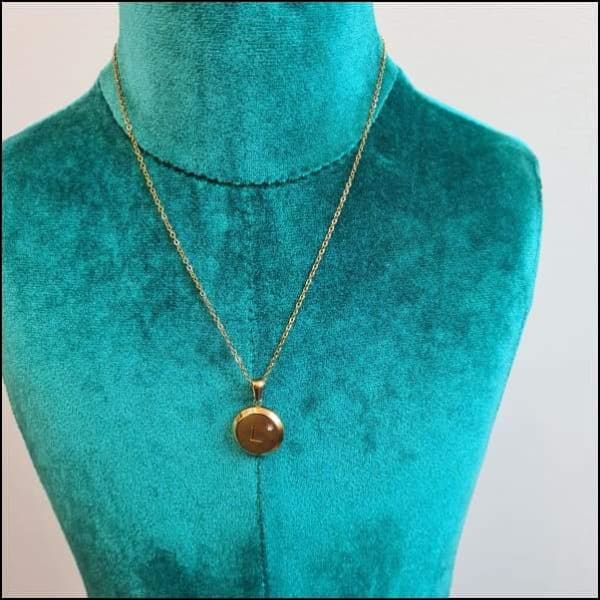 Ketting Met Gouden Disc Van Aramat Jewels.