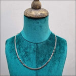 Zilverkleurige Gourmet Ketting Op Mannequin