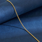 Gouden Gourmet Ketting Op Blauwe Achtergrond - Aramat Jewels