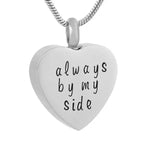 Een zilveren hart hanger met de woorden always side