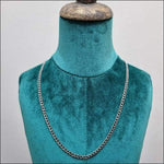 Mannequin Met Platte Gourmet Stalen Ketting Van Aramat Jewels.