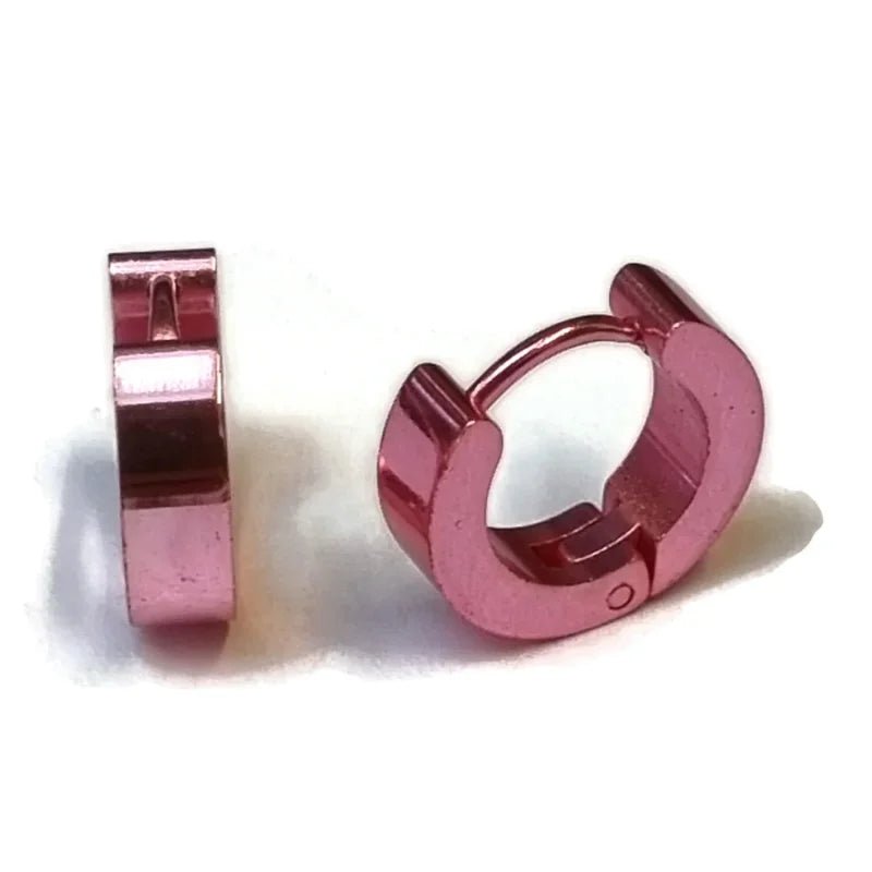 Een paar roze metalen ringen