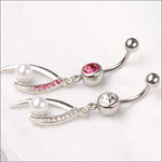 Oorbellen Met Parel En Roze Strass In Product ’navelpiercing Met Hanger Parel En Roze Strass’