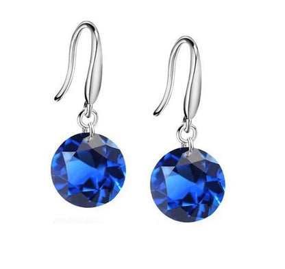 Blauwe Kristallen Oorbellen Met Zilveren Zirkonia Van Aramat Jewels.