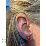 Oorstekers Acryl Staal Met Rode Piercing.