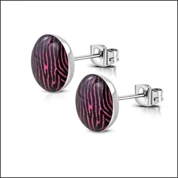 Zebra Print Oorbellen Op Roze Achtergrond.