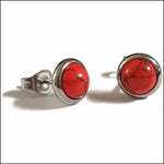 Oorbellen van rood glas