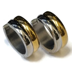 Twee Ringen Met Gouden En Zilveren Banden Op Een Wit Oppervlak, Product: Aramat Jewels® Bicolor Stalen