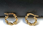 Gouden Stalen Oorringen Van Aramat Jewels® Met Gedraaid Design.