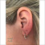 Zilveren Bali Oorringen Van Aramat Jewels® Met Kleine Oorpiercing.