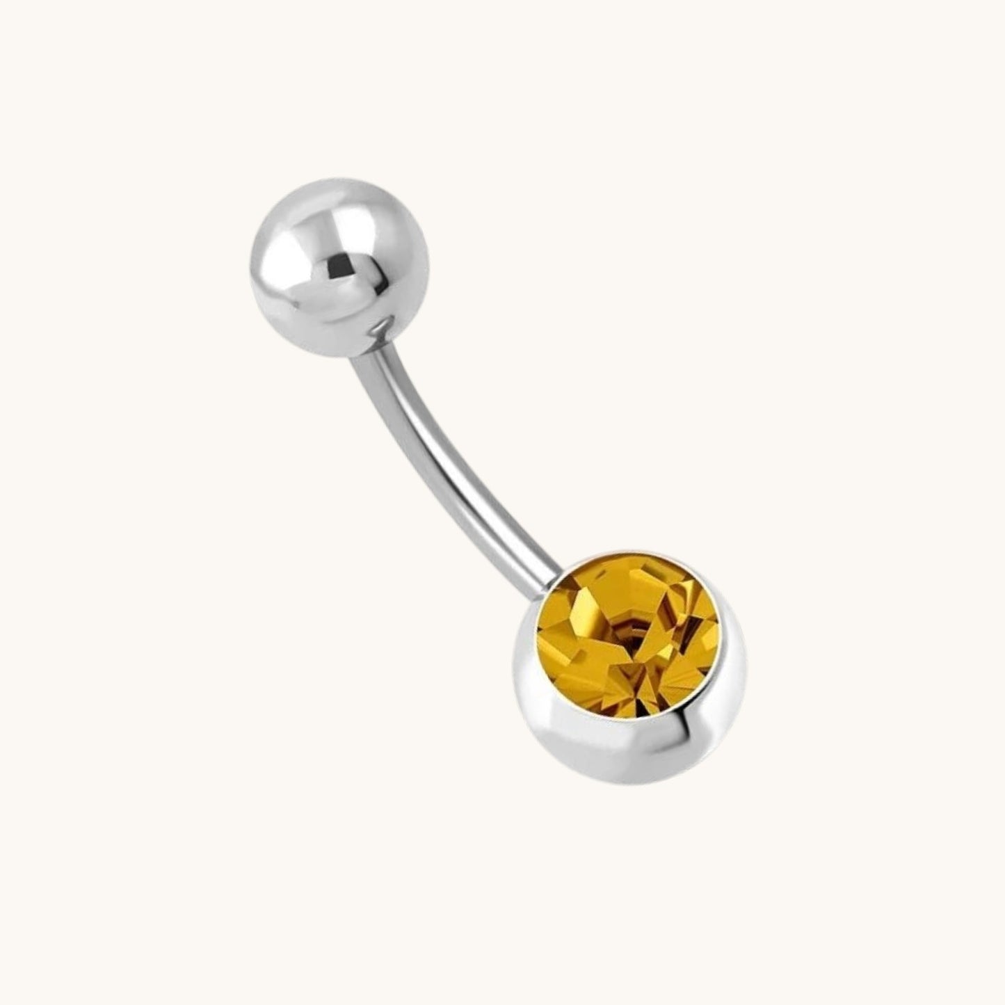 Piercing nombril en acier brun orné de zirconiums