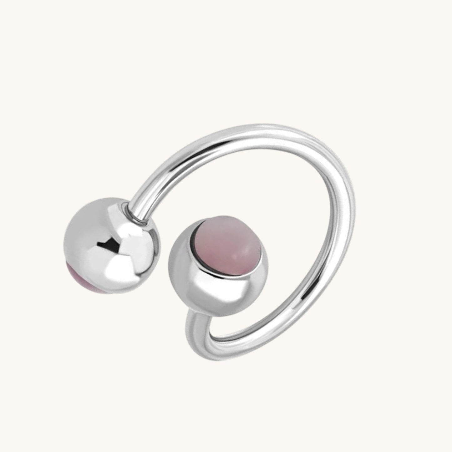 Piercing au nombril en spirale d'acier œil de chat rose