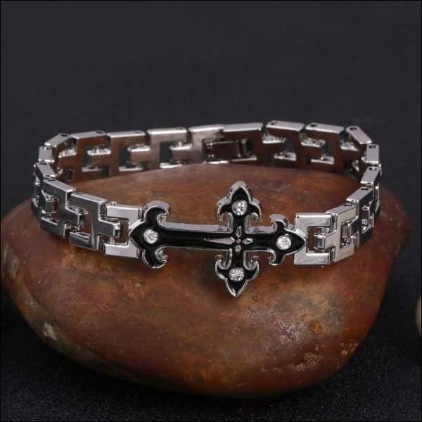 Armband With Black Cross Design And Zirconia Stone.