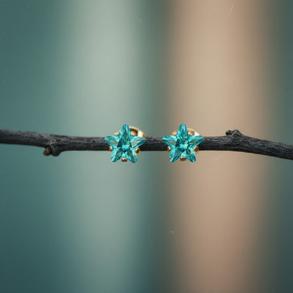 Boucles d'oreilles étoile en acier inoxydable doré avec zircon bleu