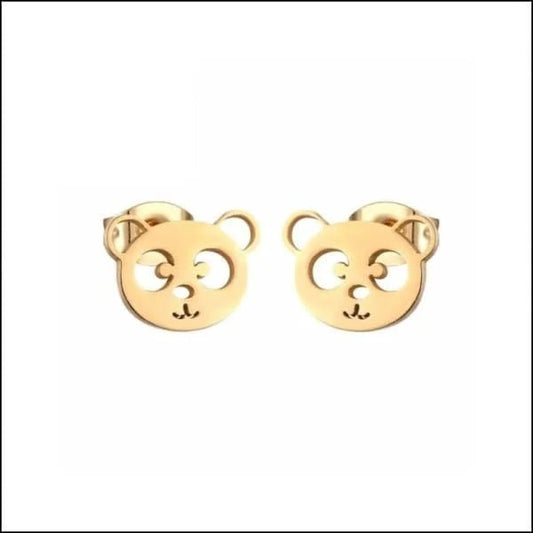 Een paar gouden oorbellen met een kattengezichtje