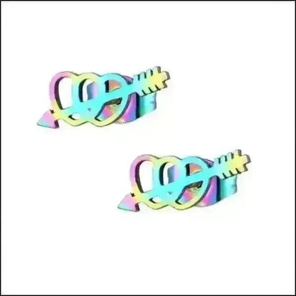 Twee iriserende haarclips in de vorm van een gitaar in pastelkleuren van de regenboog.
