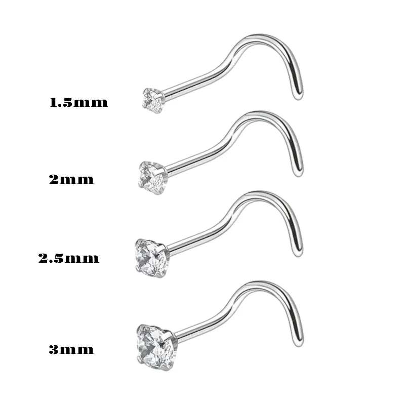 Gebogen metalen neusknopen met diamantachtige stenen in verschillende maten.