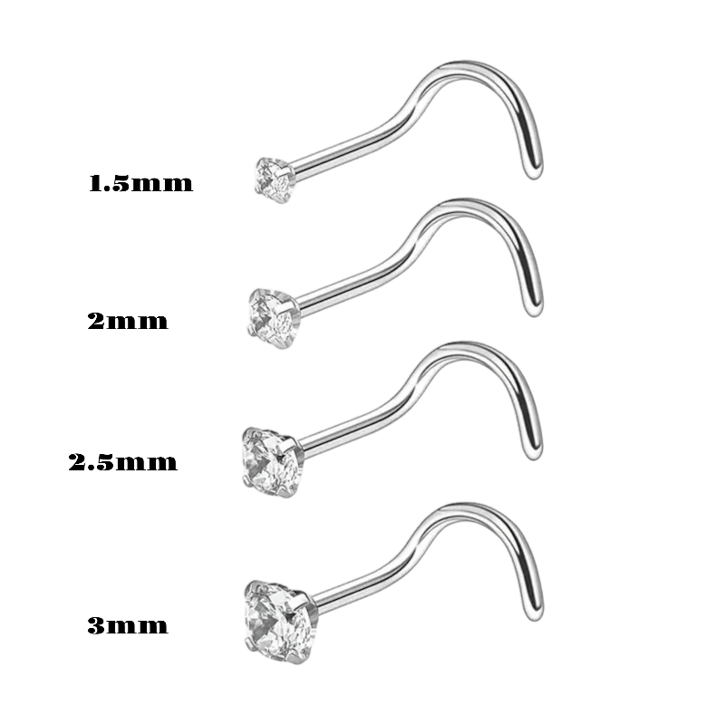 Gebogen metalen neusknopen met diamantachtige stenen in verschillende maten.