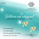 RVS letter N oorstekers goudkleurig