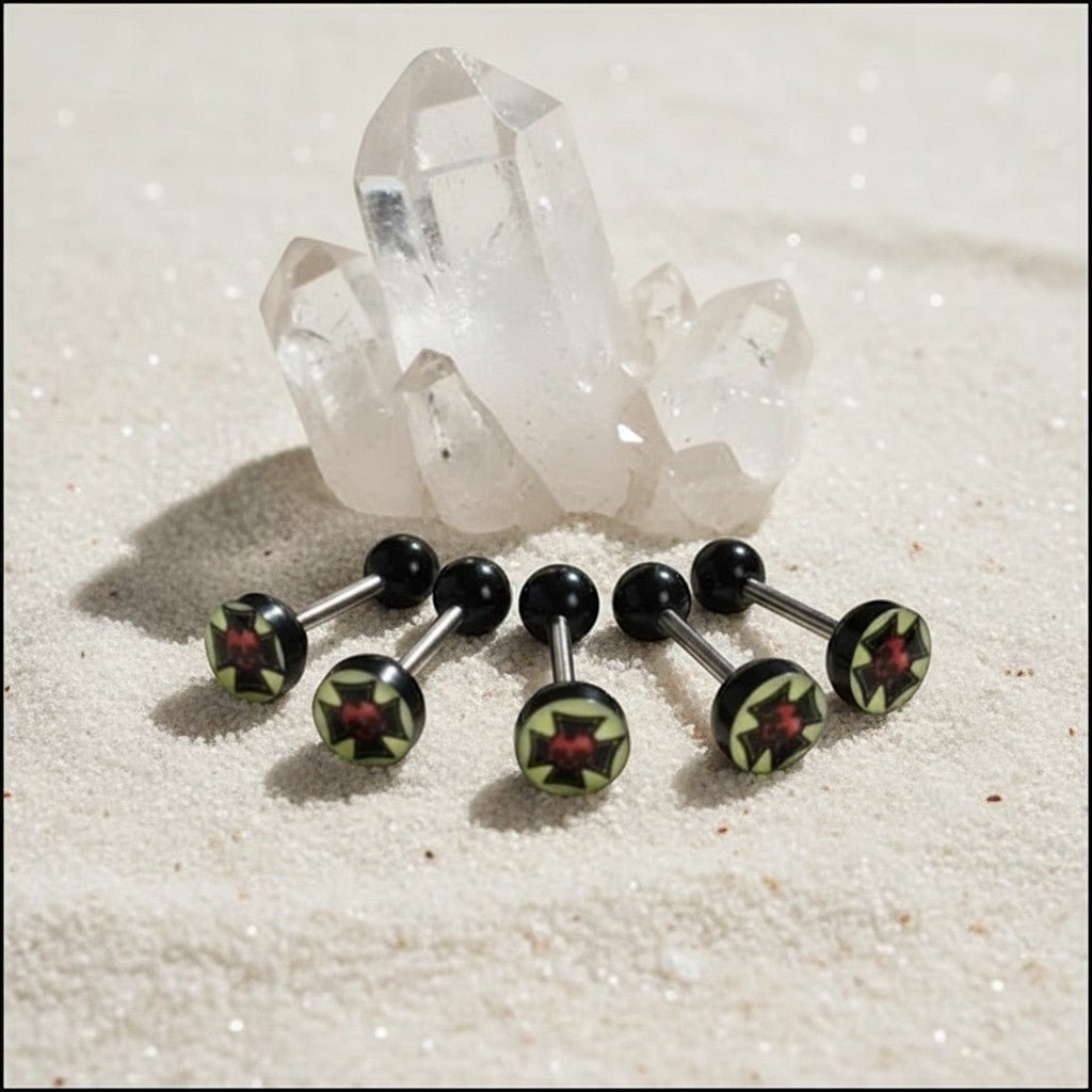 Aramat Jewels surgical steel tongue piercing with black acrylic balls and a black acrylic logo featuring a red cross design.