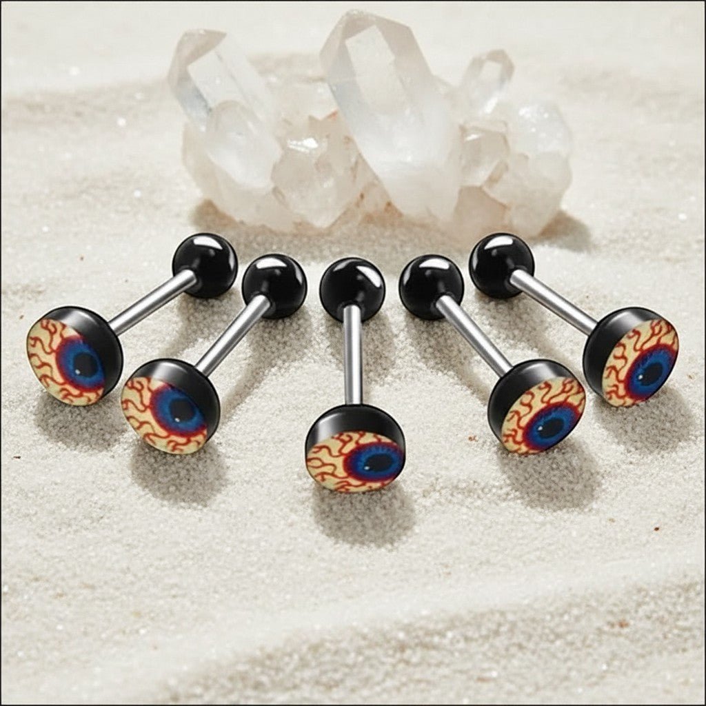 Aramat Jewels surgical steel tongue piercing with a realistic eyeball acrylic logo. Features black balls and a 16mm bar.