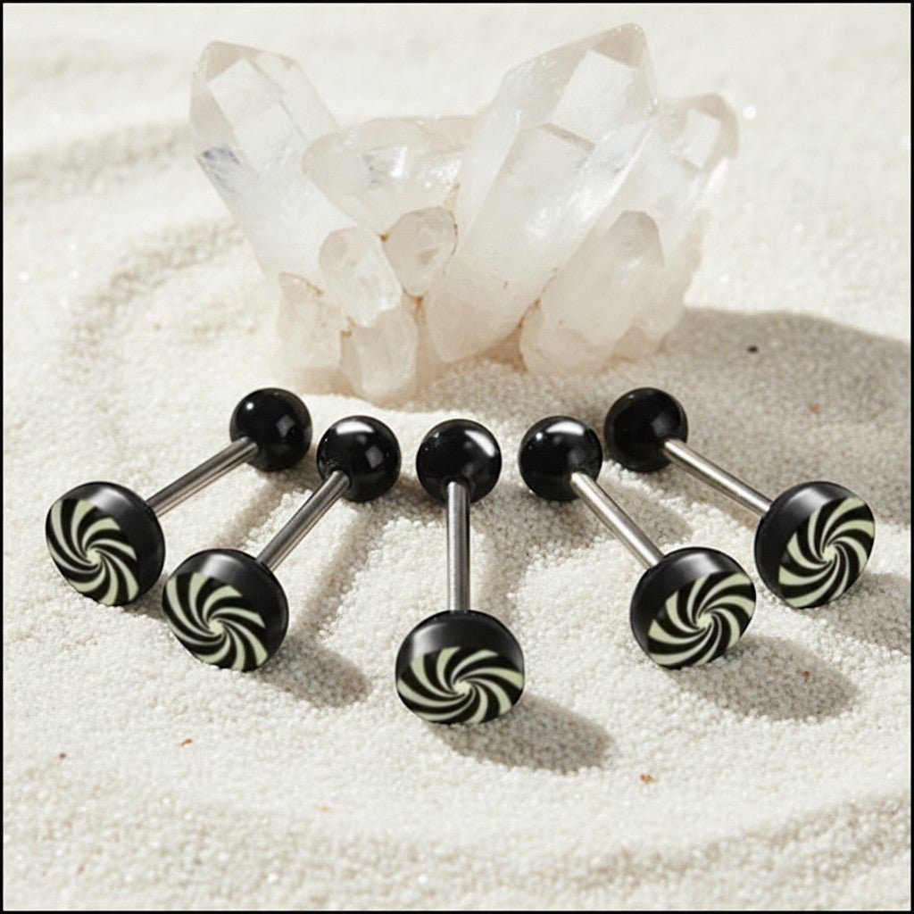 Aramat Jewels surgical steel tongue piercing with black and white swirl acrylic logo ends. 16mm bar length.