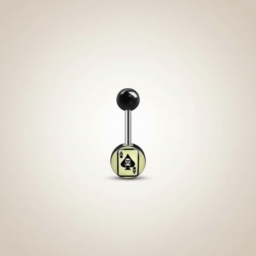 Aramat Jewels surgical steel tongue piercing with black acrylic balls and spade logo design on a light yellow background.