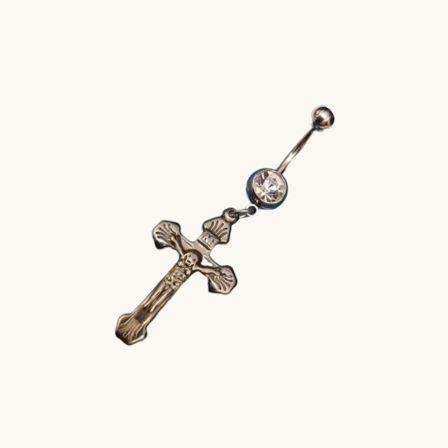Piercing nombril élégant en acier avec pendentif croix