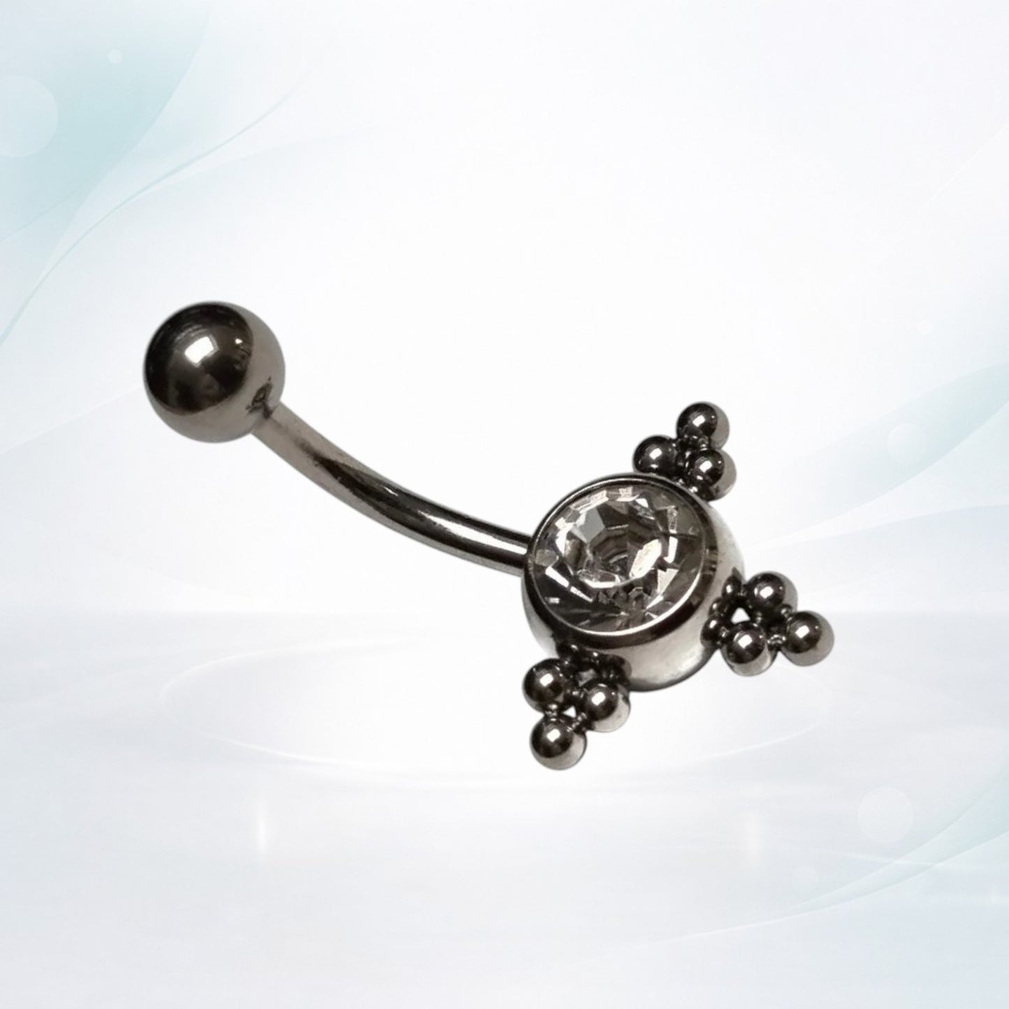 Piercing au nombril avec points de zircone transparente