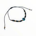 De blauwe en gouden armband