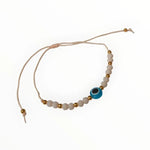 De blauwe en gouden armband