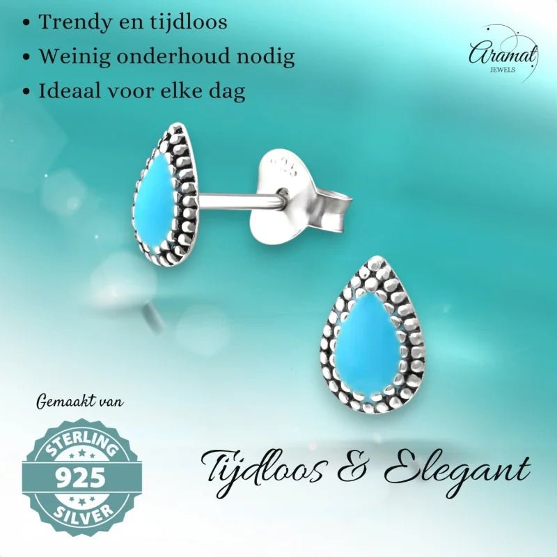 Druppelvormige turquoise oorbellen met zilveren kraaltjes.