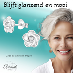 Zilveren bloem oorbellen met transparant kristal