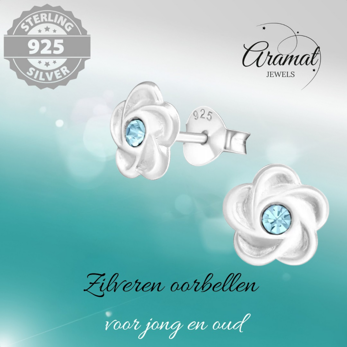 Zilveren bloemen oorstekers met blauwe kristal